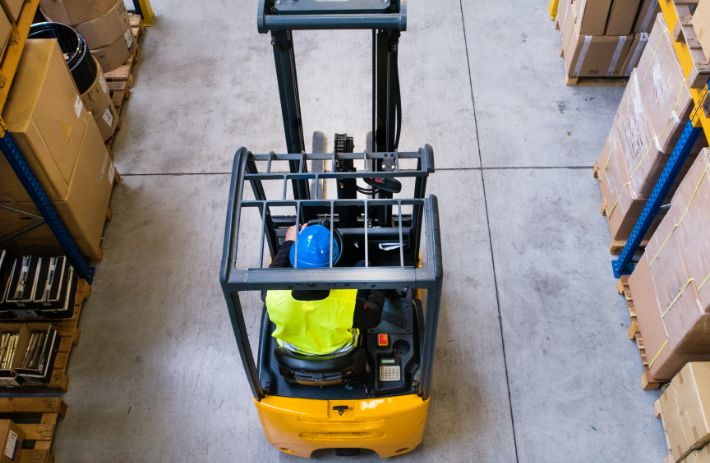 Person driving forklift